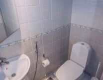 wall, sink, indoor, plumbing fixture, bathtub, shower, tap, bathroom accessory, toilet, bathroom, bidet, bathroom sink, mirror, bath